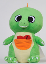 A green stuffed animal with an apple in its pocket.